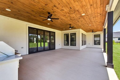 Welcome to this stunning 4-bedroom, 3-bathroom home in the gated - photo 34