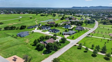 Welcome to this stunning 4-bedroom, 3-bathroom home in the gated - photo 37