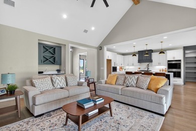 Welcome to this stunning 4-bedroom, 3-bathroom home in the gated - photo 39