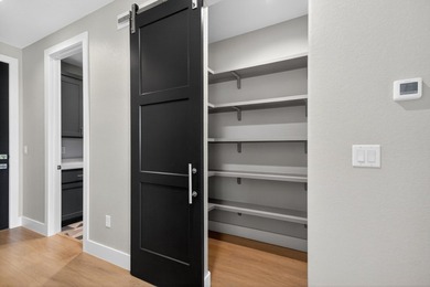 Welcome to this stunning 4-bedroom, 3-bathroom home in the gated - photo 40