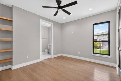 Welcome to this stunning 4-bedroom, 3-bathroom home in the gated - photo 41