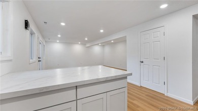 Welcome to 338 Crane Cove - a stunning, fully remodeled Lake of - photo 12