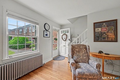 Completely renovated and move-in ready, this stylish two-level - photo 2