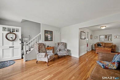 Completely renovated and move-in ready, this stylish two-level - photo 3
