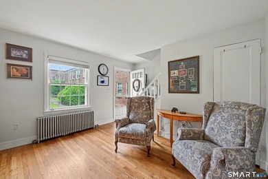 Completely renovated and move-in ready, this stylish two-level - photo 4
