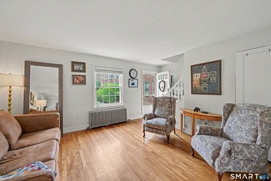 Completely renovated and move-in ready, this stylish two-level - photo 6