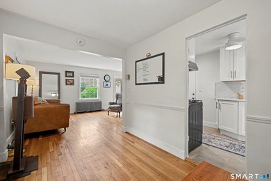 Completely renovated and move-in ready, this stylish two-level - photo 8