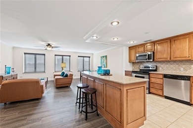 Welcome to this fresh and updated sun-filled condo that captures