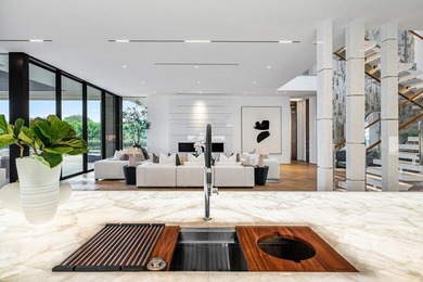 Step into unparalleled luxury in this brand-new custom estate