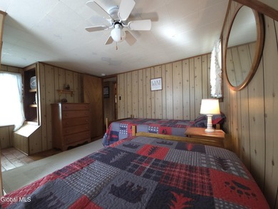 Discover the enduring charm of the Adirondack region with this - photo 13