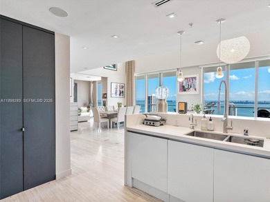 Penthouse 207 is a two-story residence offering expansive