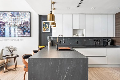 Penthouse 207 is a two-story residence offering expansive