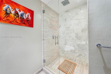 Penthouse 207 is a two-story residence offering expansive