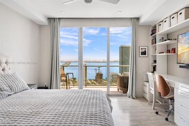 Penthouse 207 is a two-story residence offering expansive