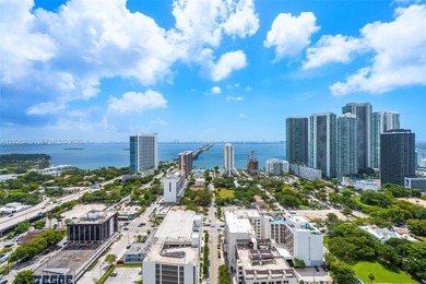 Penthouse 207 is a two-story residence offering expansive