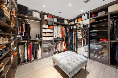 Penthouse 207 is a two-story residence offering expansive