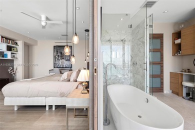 Penthouse 207 is a two-story residence offering expansive