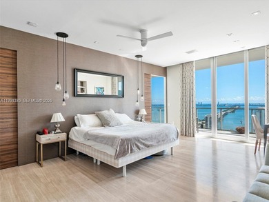 Penthouse 207 is a two-story residence offering expansive