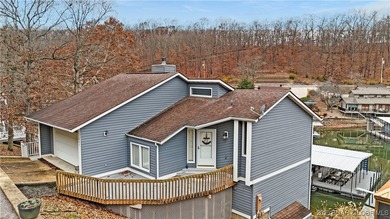 BACK ON THE MARKET!! Well-maintained waterfront home located in - photo 6
