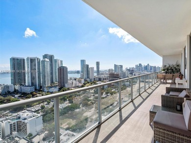 Penthouse 207 is a two-story residence offering expansive
