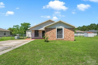 Located in Bay Pine Villas, this charming 3 bedroom, 2 bath home - photo 1