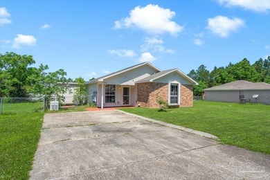 Located in Bay Pine Villas, this charming 3 bedroom, 2 bath home - photo 2