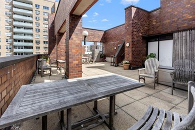 Perched on the 20th floor of a full-service Upper East Side - photo 21