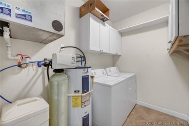 Experience carefree lake living at Sunset Palms, one of Lake of - photo 20