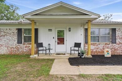 Beautifully maintained 4-bedroom, 2-bath brick home situated on - photo 2