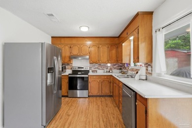 Beautifully maintained 4-bedroom, 2-bath brick home situated on - photo 8