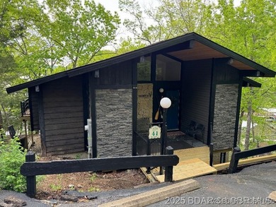 Discover lake living at its finest in the iconic Tan-Tar-A