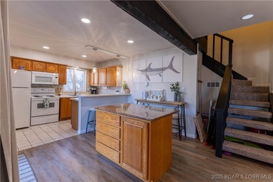 Discover lake living at its finest in the iconic Tan-Tar-A