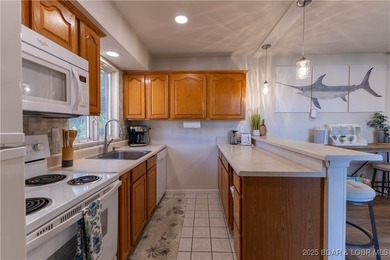 Discover lake living at its finest in the iconic Tan-Tar-A