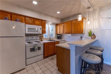 Discover lake living at its finest in the iconic Tan-Tar-A