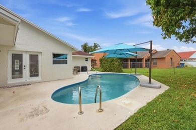 Welcome to your ultimate South Florida oasis! Nestled in the - photo 31