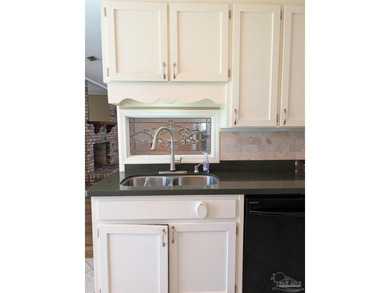 Price Improvement! This lovely home is located in northeast - photo 8