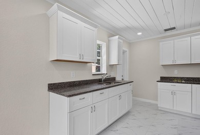 Welcome to this charming 3-bed, 1-bath concrete block home - photo 12