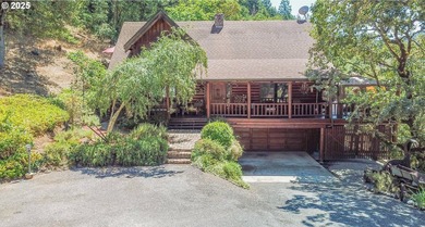 This beautiful log home features soaring ceilings and large - photo 2