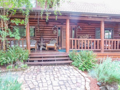 This beautiful log home features soaring ceilings and large - photo 3