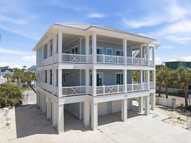 Newly completed in 2026, this stunning corner-lot beach home - photo 1