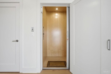 Newly completed in 2026, this stunning corner-lot beach home - photo 4