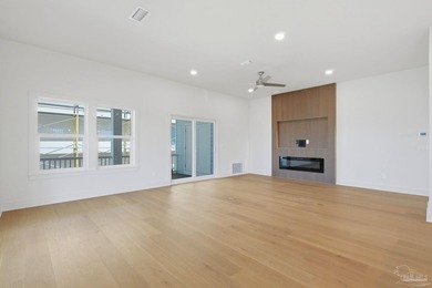 Newly completed in 2026, this stunning corner-lot beach home - photo 9