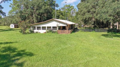 Lake Home Off Market in Chiefland, Florida