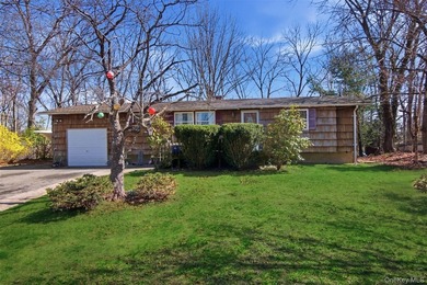 Nestled in Three Village School District, this four bedroom - photo 1