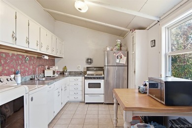 Nestled in Three Village School District, this four bedroom - photo 8