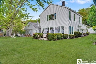 Nestled along the tranquil shores of Chautauqua Lake, this - photo 8