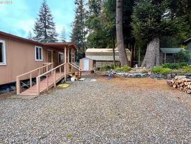 Move-in ready 1991 Skyline home in Port Orford! Features include - photo 2