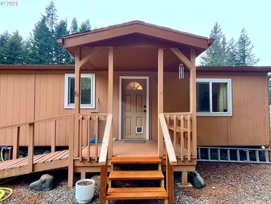 Move-in ready 1991 Skyline home in Port Orford! Features include - photo 3