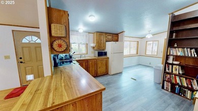 Move-in ready 1991 Skyline home in Port Orford! Features include - photo 10
