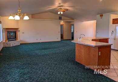 This well-maintained 3-bedroom, 2-bathroom brick home sits on 5